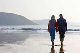 Couple walking on the beach